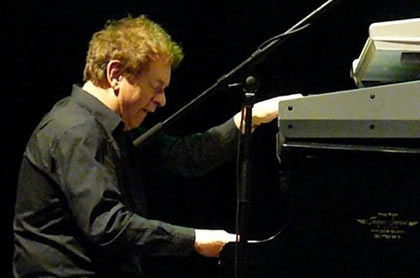 Bill Sharpe at the piano